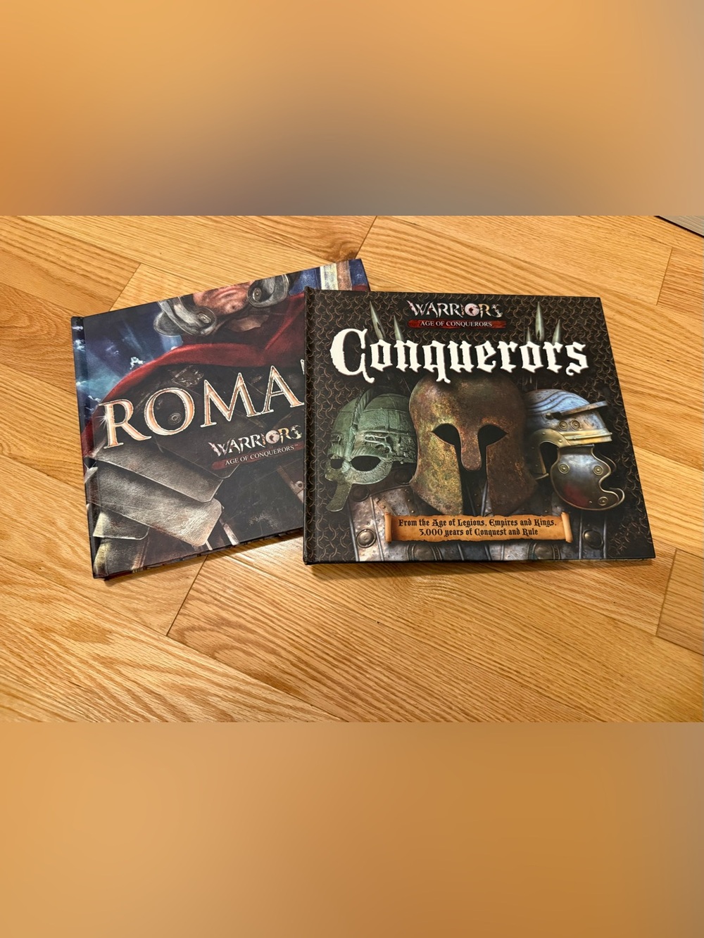 Warriors age of conquerors: Conquerors book and Romans book